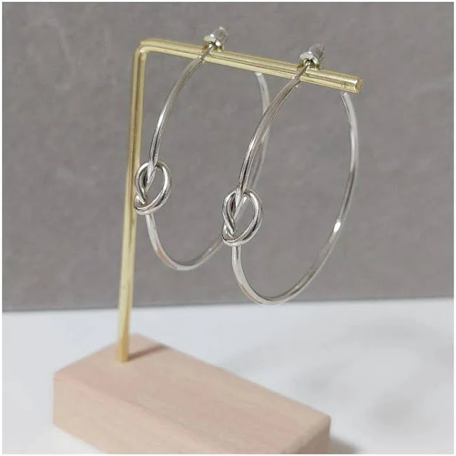 accessory Сережки кільця масивні з вузликом BS015 DeKolie срібний. Біжутерні сережки ROZETKA $99