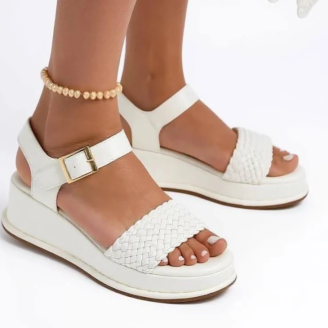 shoes Royalfashion Жіночі босоніжки на танкетці з плетеним ремінцем Fiolle Royalfashion.com.ua $767