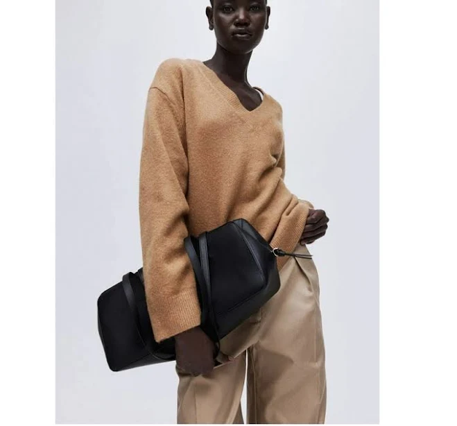 top Женский свитер оверсайз с V-образным вырезом H&M (58692) XS Бежевый. Женские свитера ROZETKA $1687